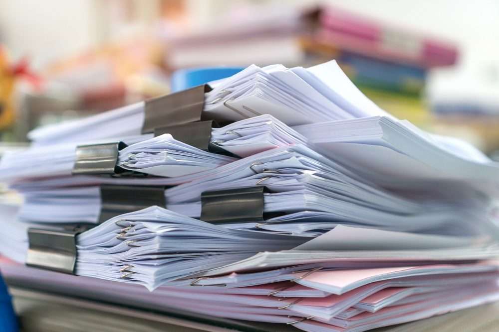 pile of business documents for processing