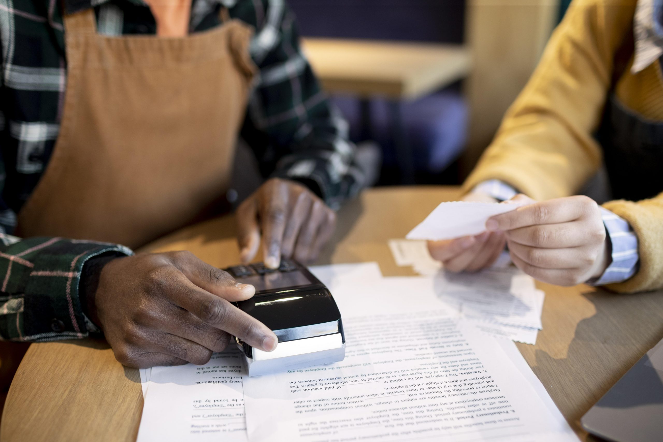 close-up-hands-with-receipts